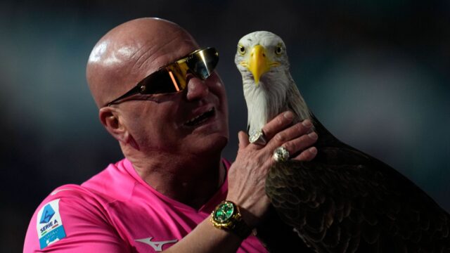 Mascotte of the ss lazio eagle olimpia with the head coach juan bernabe prior to serie a ss lazio v atalanta olimpico december 28 2024 rome italyjpg