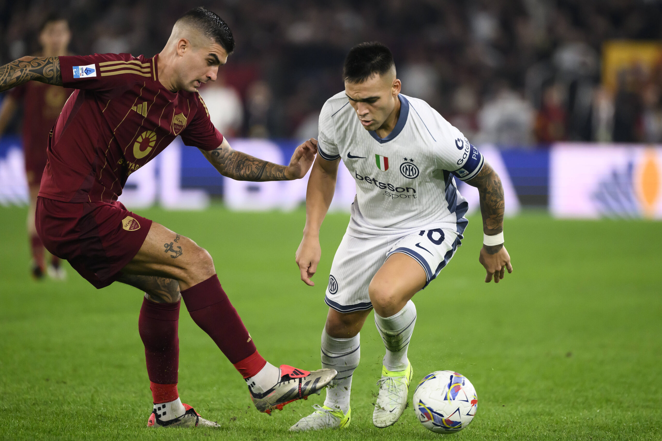 Gianluca Mancini e Lautaro Martinez