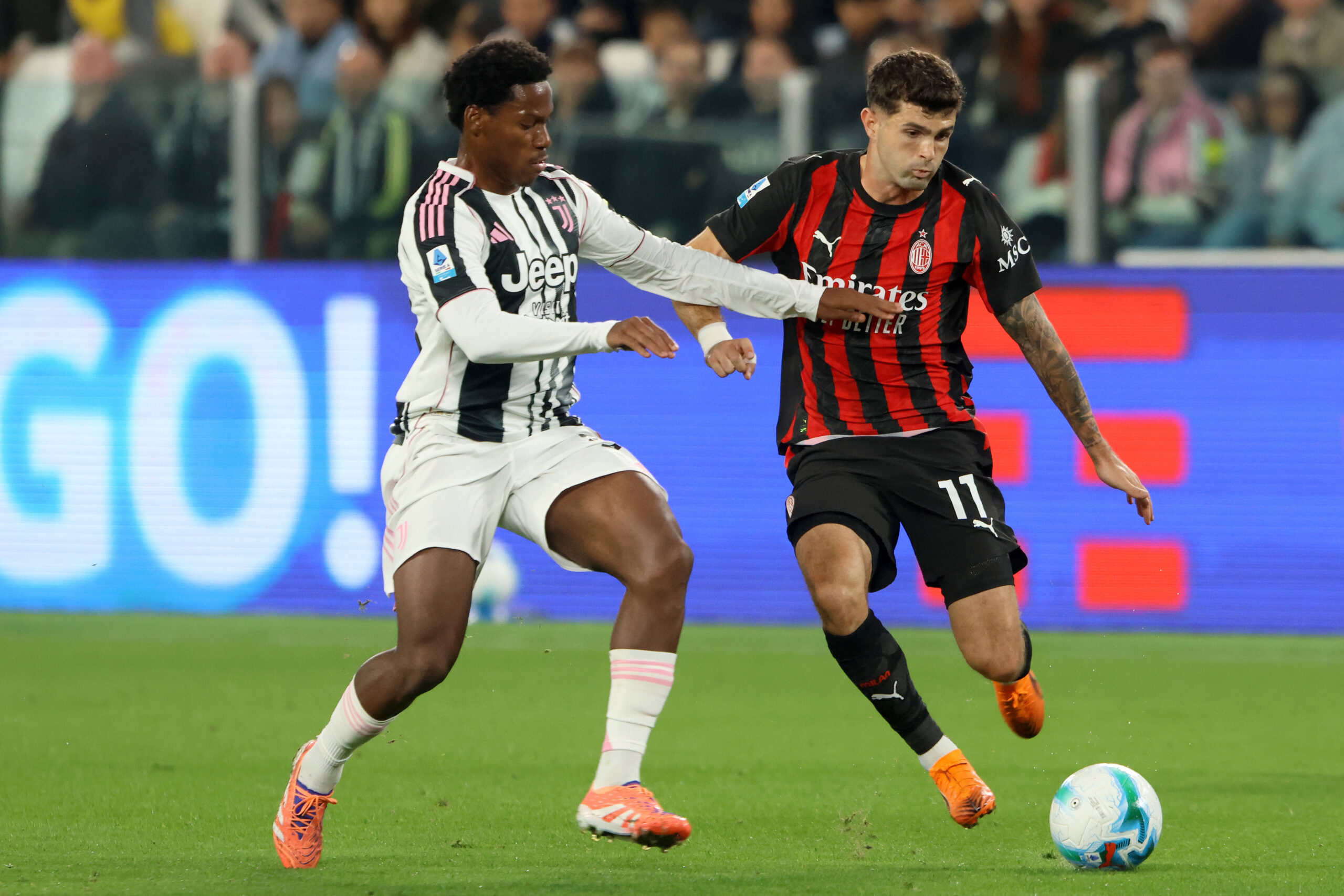 David e Pulisic durante Juventus-Milan